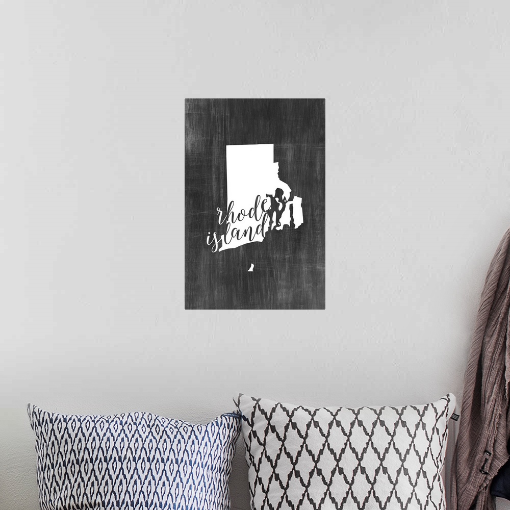A bohemian room featuring Rhode Island state outline typography artwork.