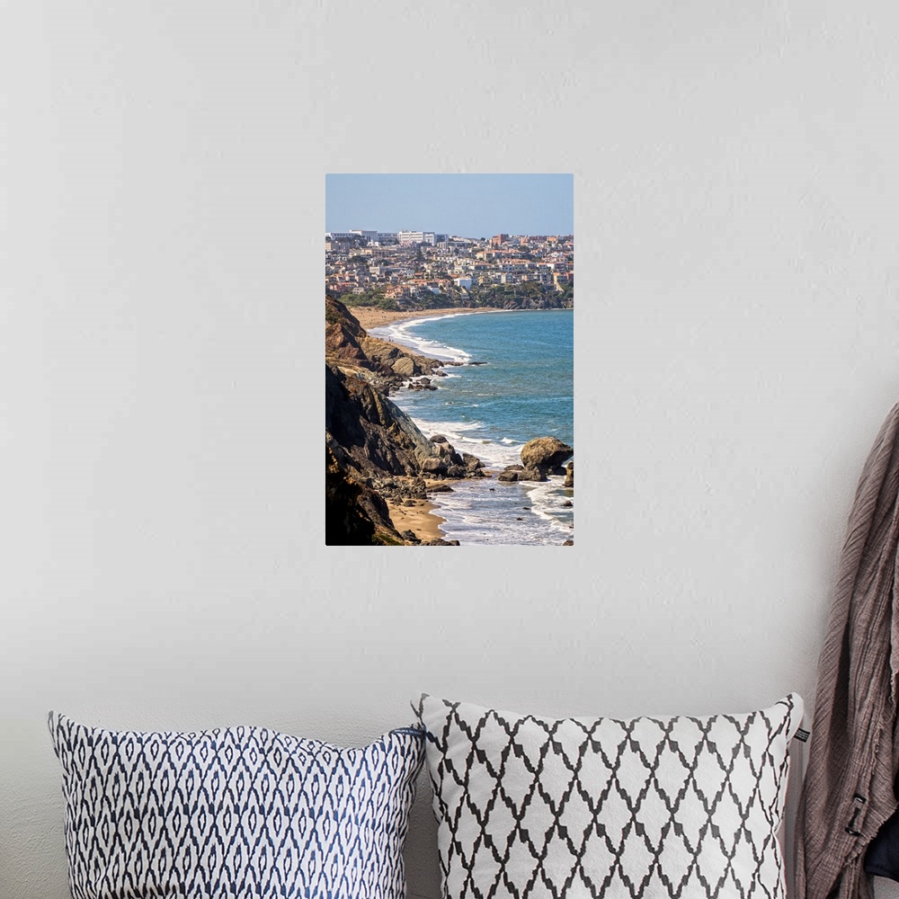 A bohemian room featuring Landscape photograph of the rocky Pacific coast in Sausalito, California.