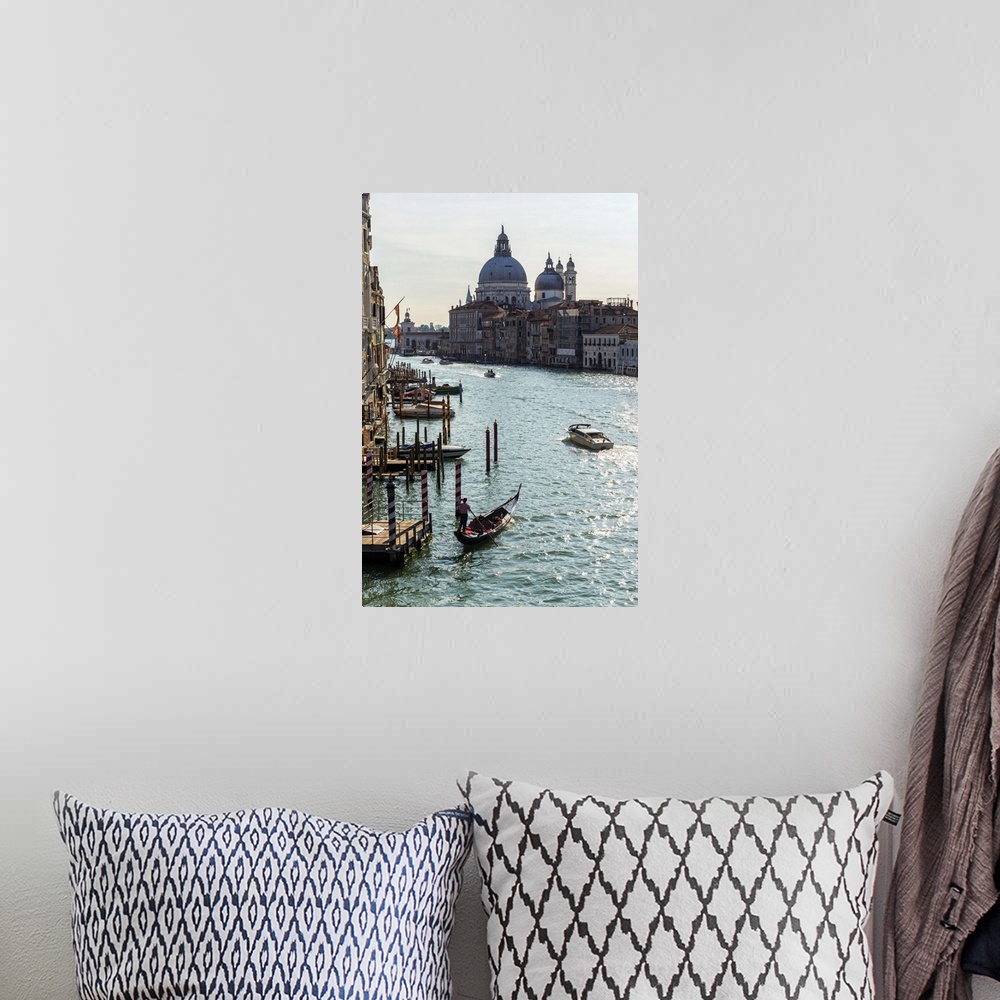 A bohemian room featuring Landscape photograph of gondolas and boats on the Grand Canal with Santa Maria della Salute in th...