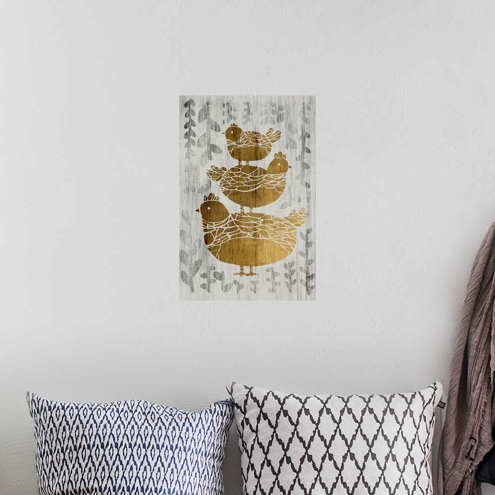 A bohemian room featuring Gold leaf on weathered wood with a fern pattern of three chickens.