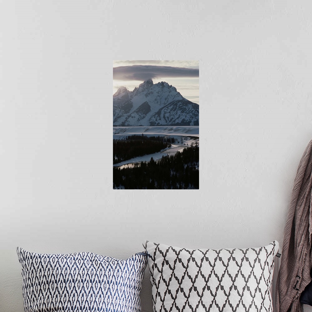 A bohemian room featuring Grand Teton Mountain and the Snake River in winter.