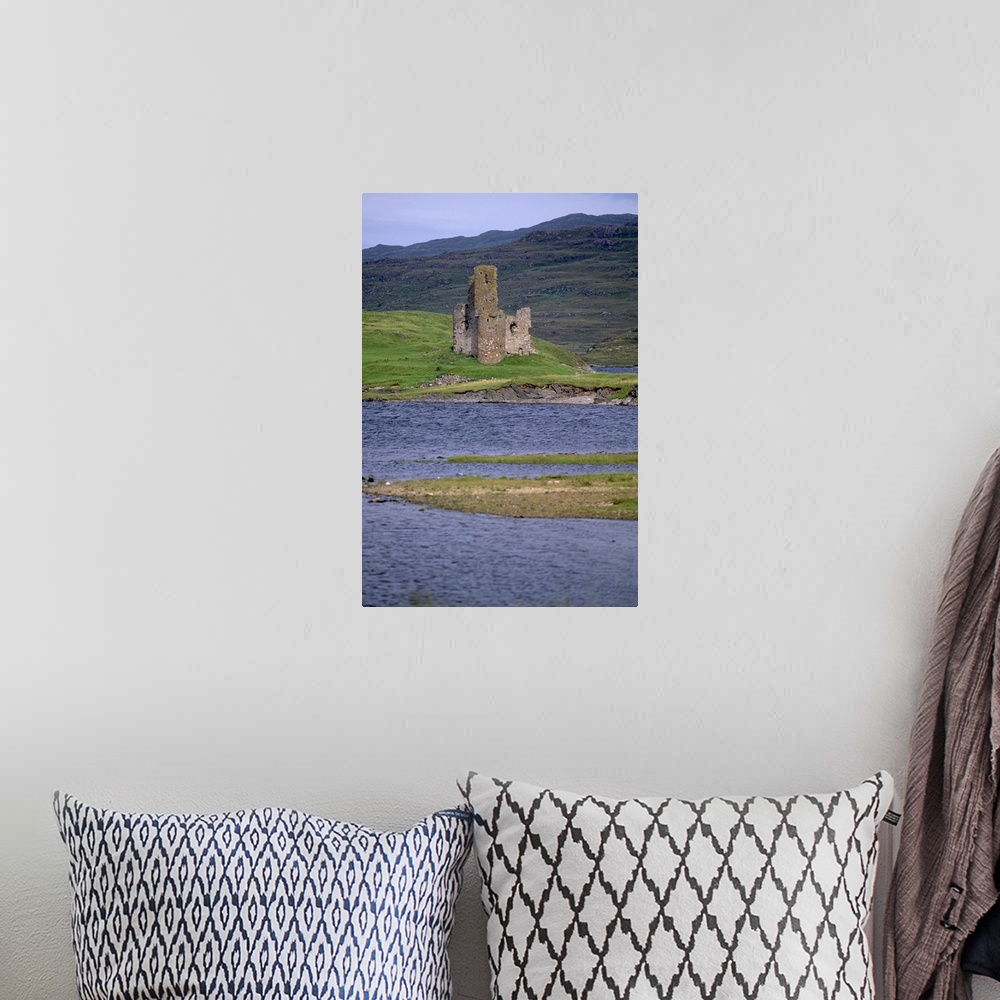 A bohemian room featuring Ardwreck Castle, on the shores of Loch Assynt, Highland region, Scotland, UK