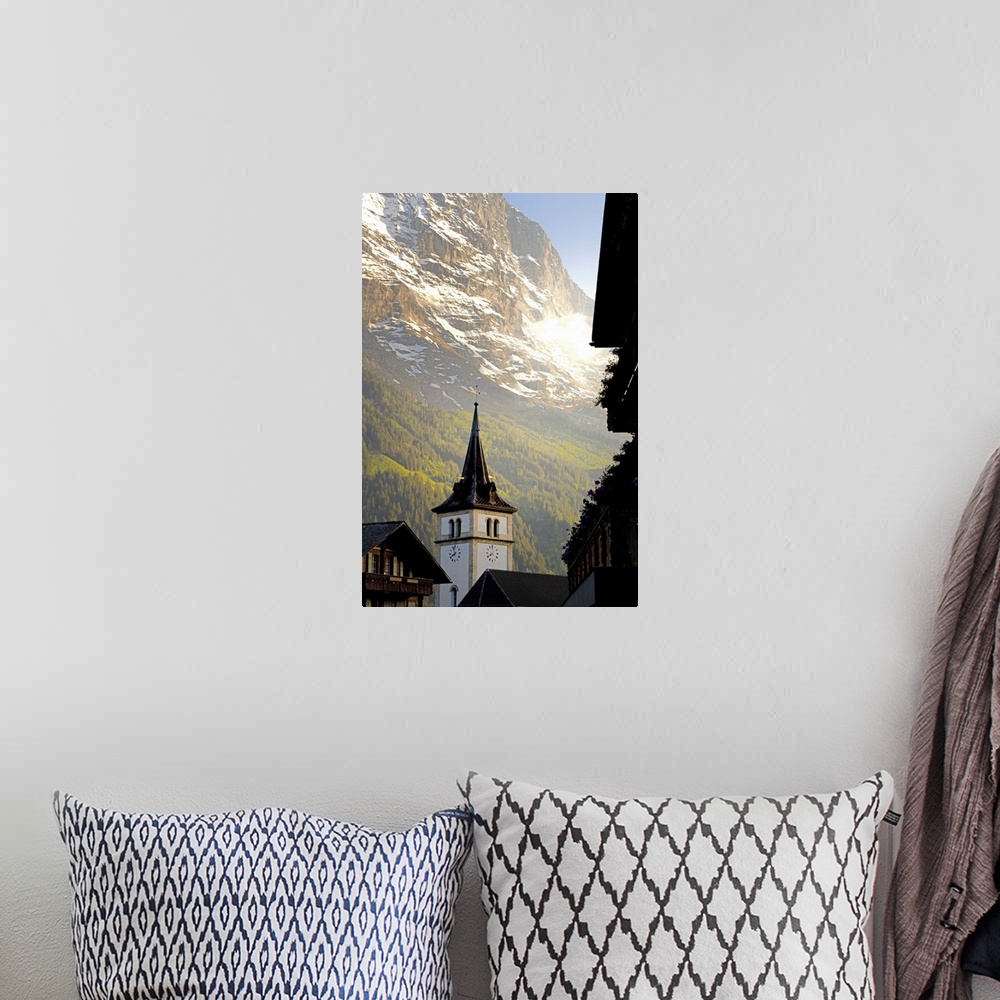 A bohemian room featuring Church tower, Grindelwald, Bern, Switzerland