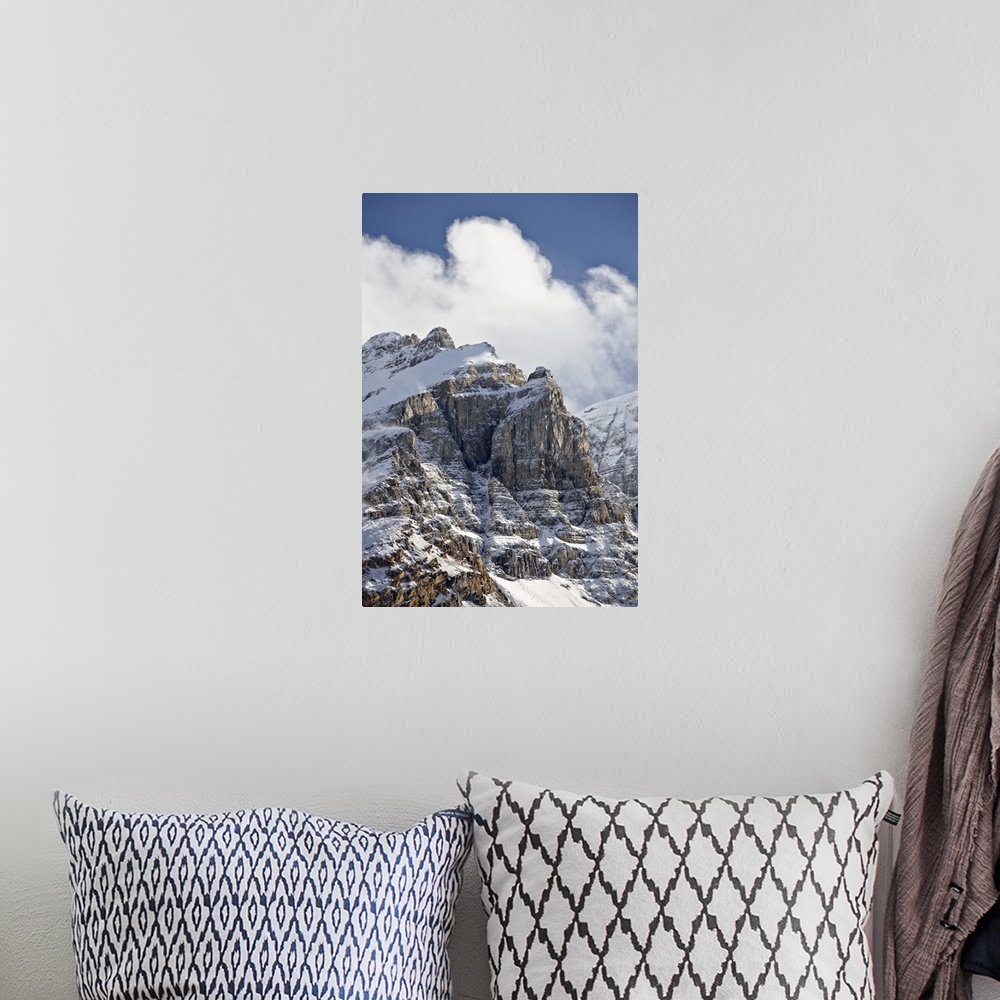 A bohemian room featuring Craggy mountains with clouds and snow cover, Jasper National Park, Alberta, Canada