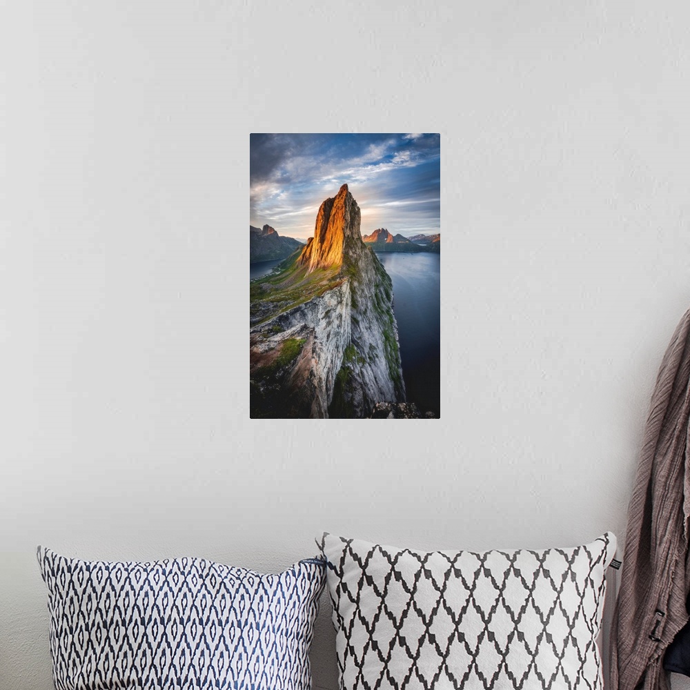 A bohemian room featuring Majestic Mount Segla and fjords under a cloudy sky at sunrise, Senja island,Troms county, Norway,...