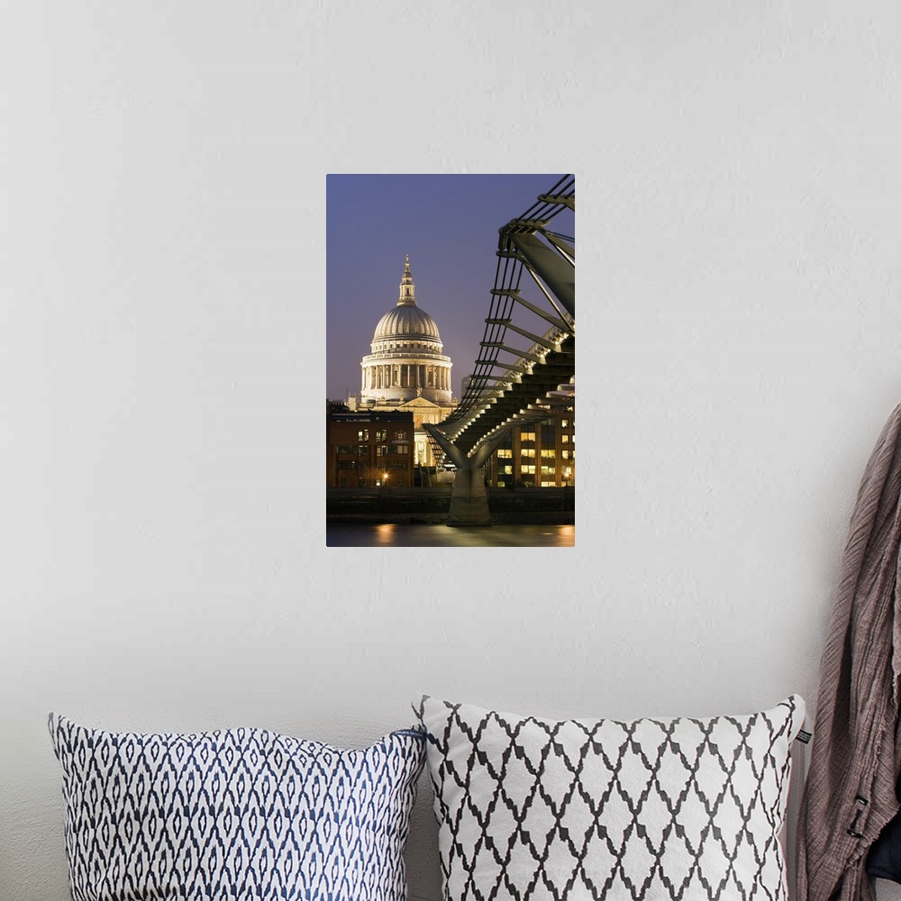 A bohemian room featuring Millennium Bridge and St. Pauls Cathedral, illuminated at dusk, London, England