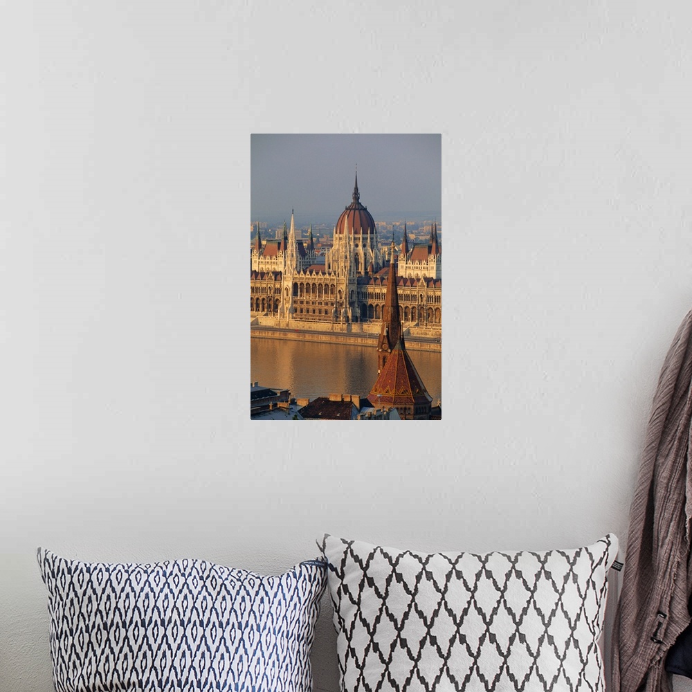 A bohemian room featuring Parliament building and the Danube River from the Castle district, Budapest, Hungary