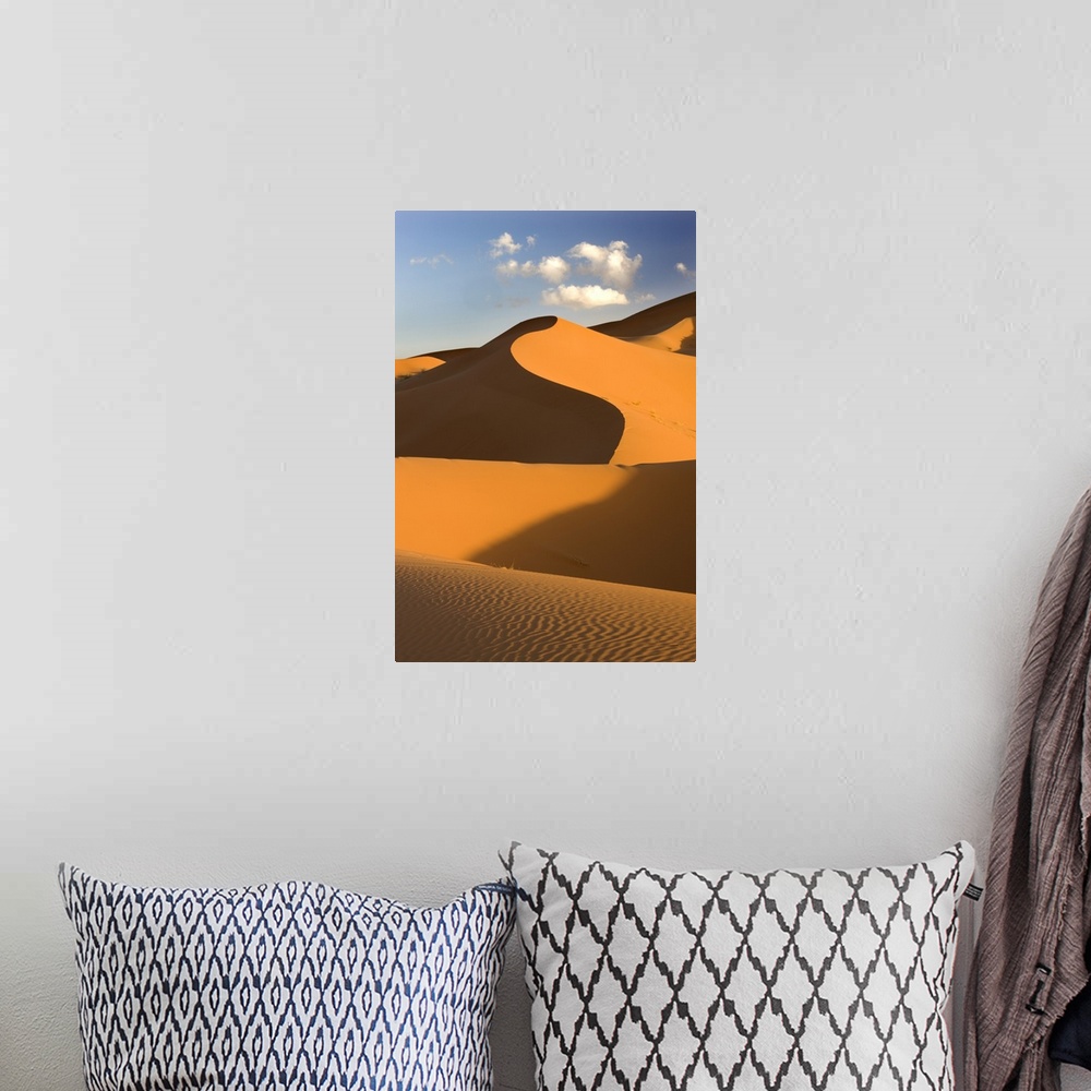 A bohemian room featuring Rolling orange sand dunes and sand ripples, Erg Chebbi sand sea, Morocco