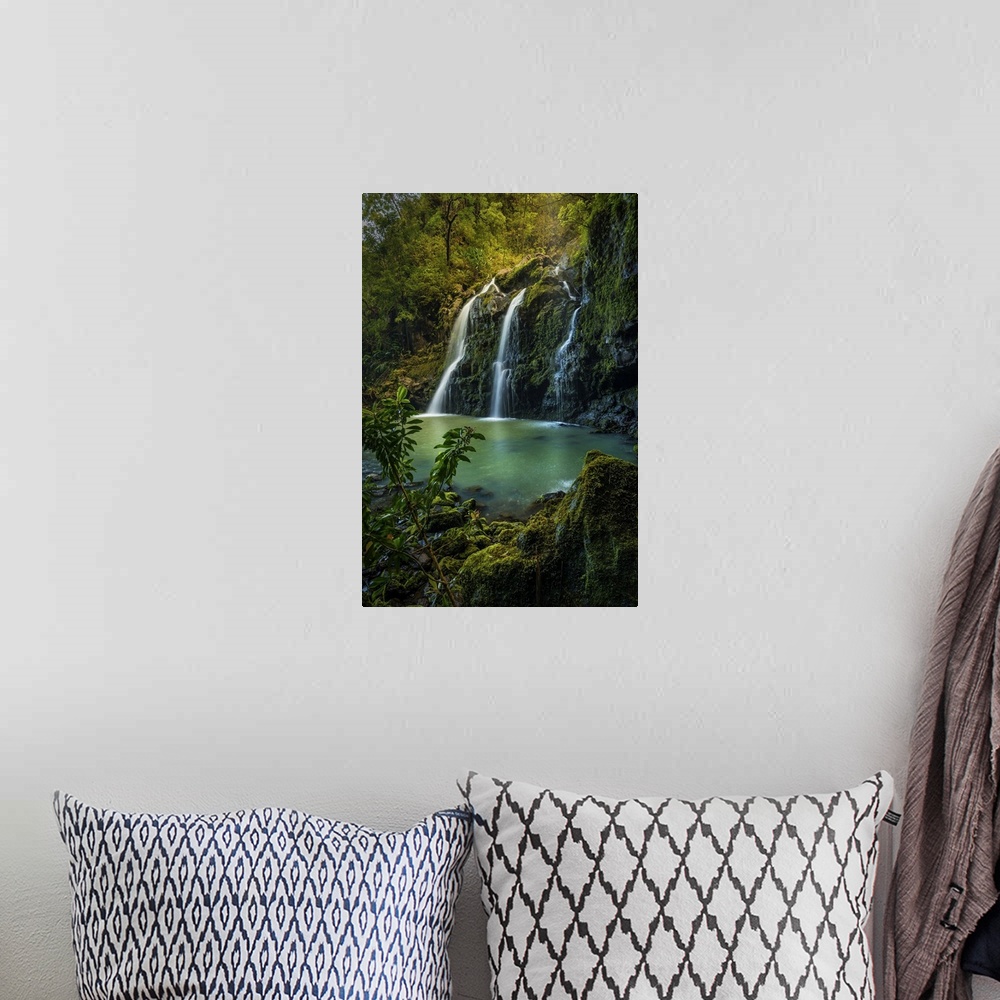 A bohemian room featuring Upper Waikani Falls (Three Bears Falls) in soft sunset light catching early evening mist, Maui, H...