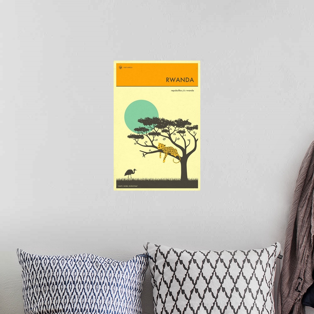 A bohemian room featuring Minimalist retro style Visit Africa travel poster for Rwanda.
