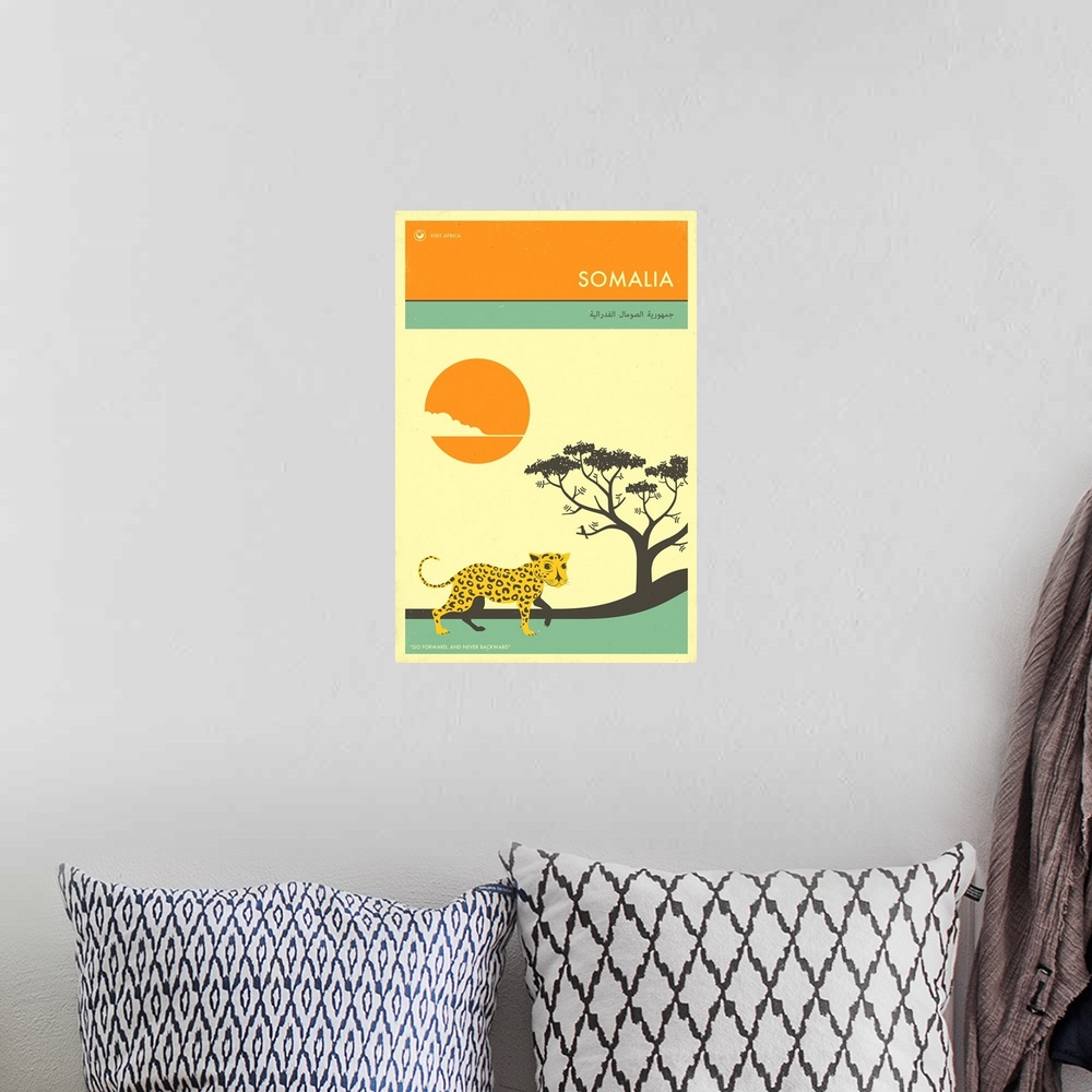 A bohemian room featuring Minimalist retro style Visit Africa travel poster for Somalia.