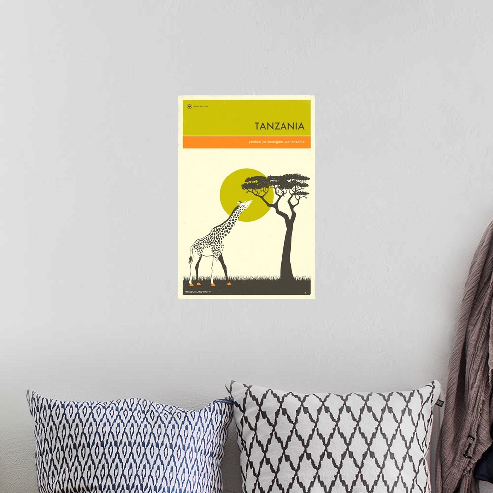 A bohemian room featuring Minimalist retro style Visit Africa travel poster for Tanzania.