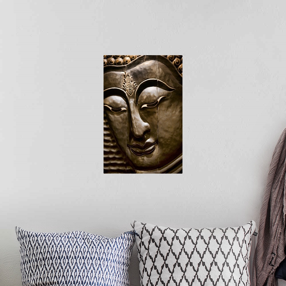 A bohemian room featuring Buddha Sculpture in South East Asia