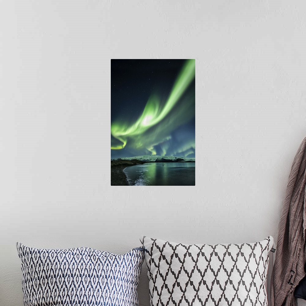 A bohemian room featuring Aurora Borealis above Jokulsarlon Lagoon in Iceland.
