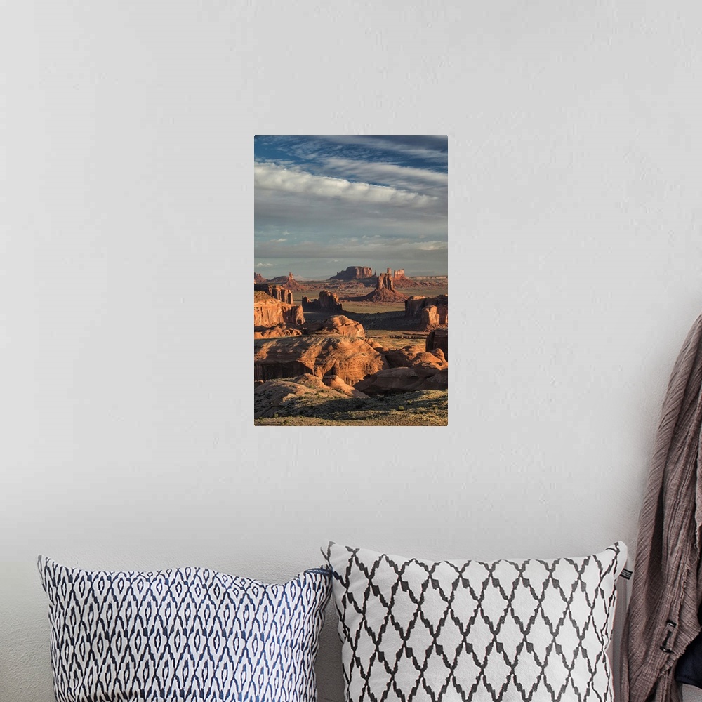 A bohemian room featuring Picturesque Hunts Mesa rock formation in Monument Valley, Arizona