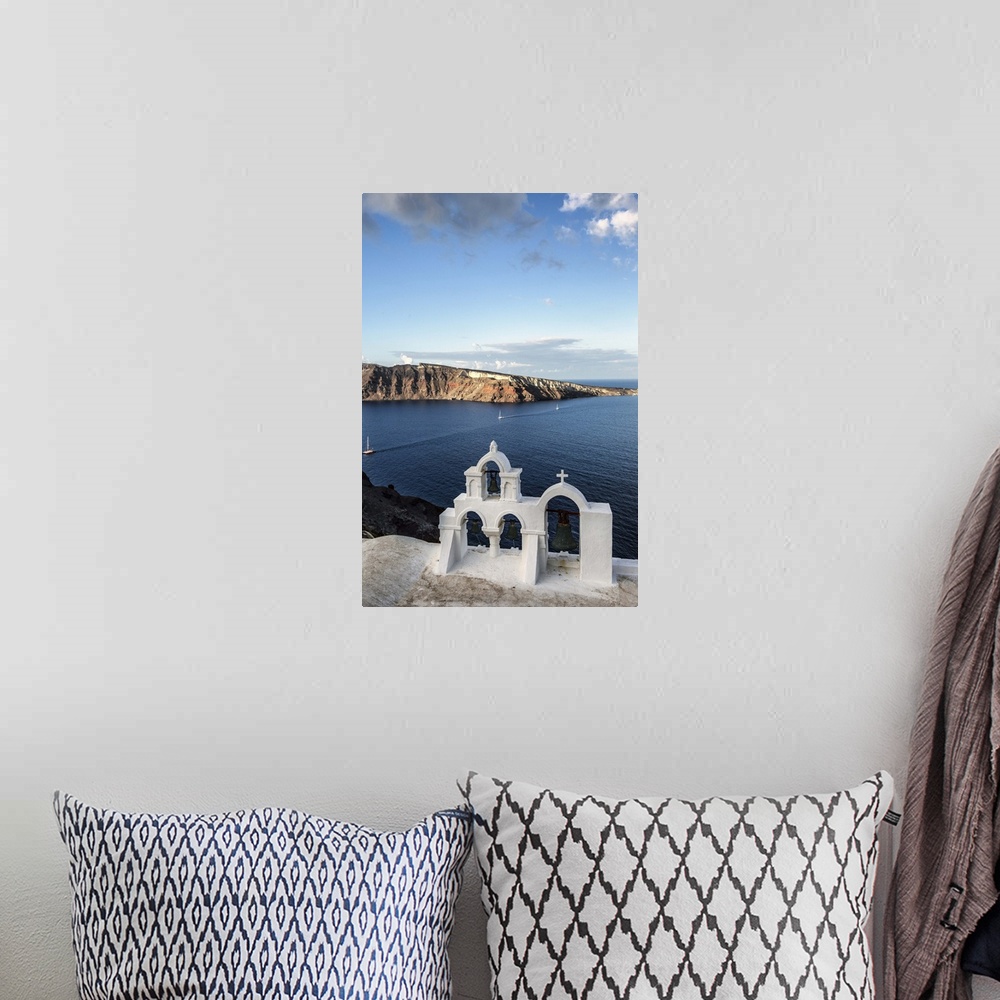A bohemian room featuring Sunset and church on Oia, Santorini, Greece