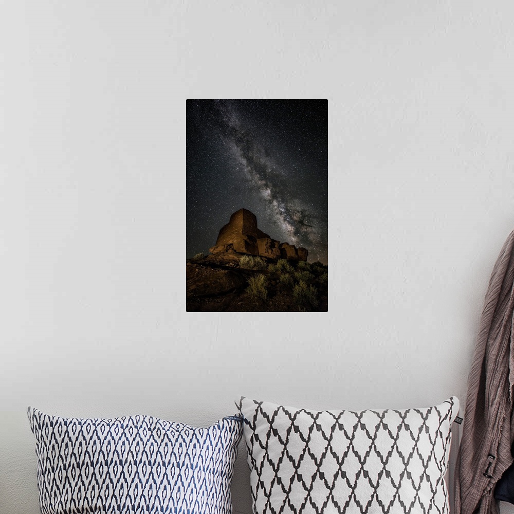 A bohemian room featuring The Milky Way over Palatki Indian Ruins in Arizona.