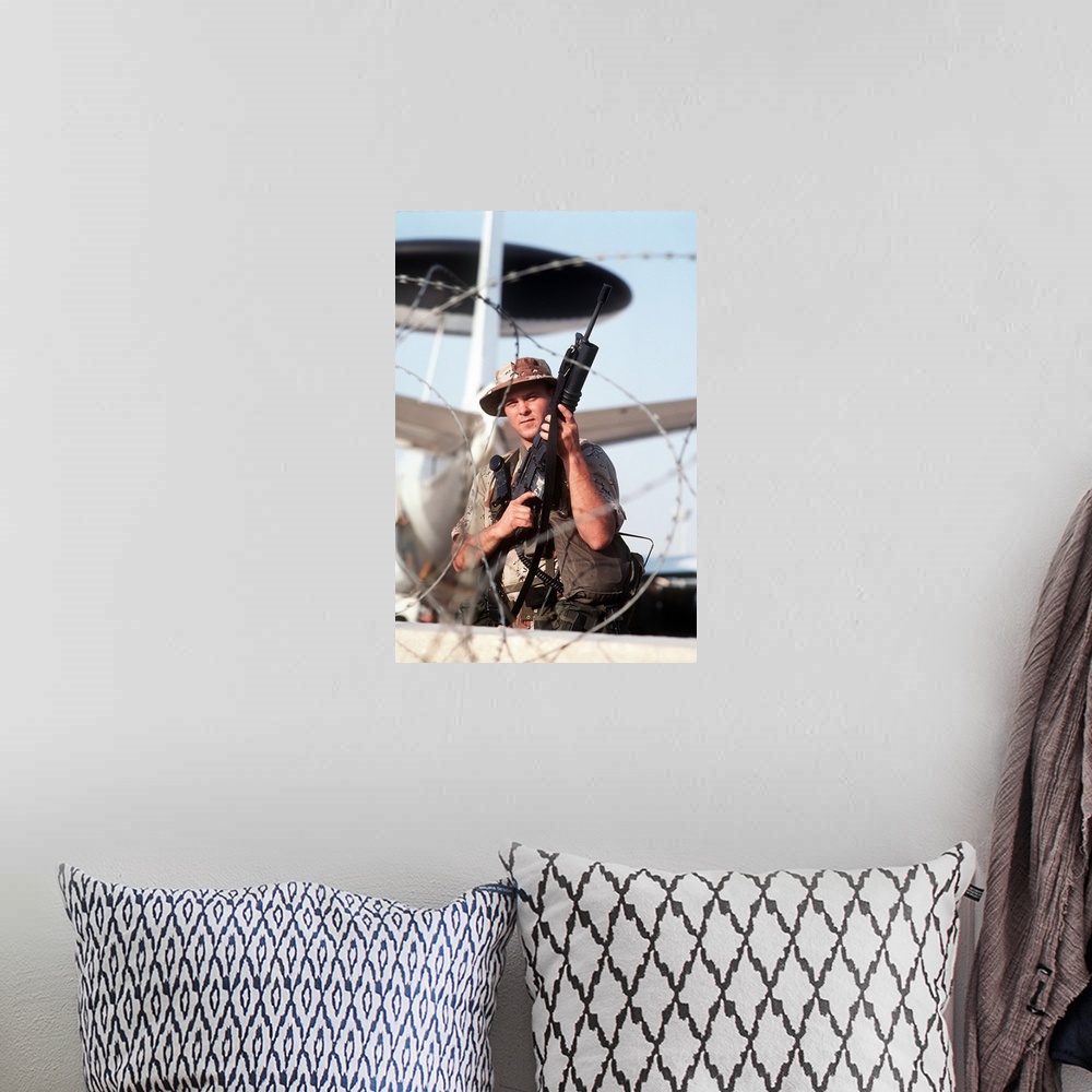 A bohemian room featuring A soldier posts security during Operation Desert Storm.
