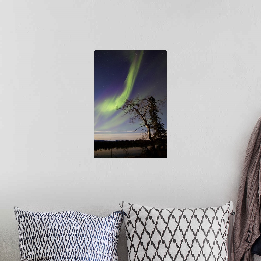 A bohemian room featuring Aurora borealis over the Yukon River, Whitehorse, Yukon, Canada.