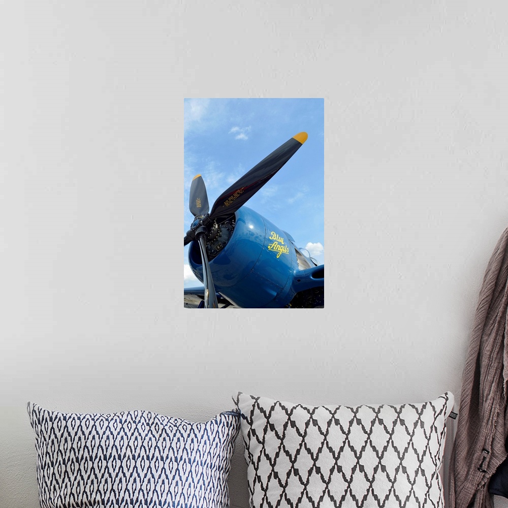 A bohemian room featuring Low angle view of the propeller on a F8F Bearcat.