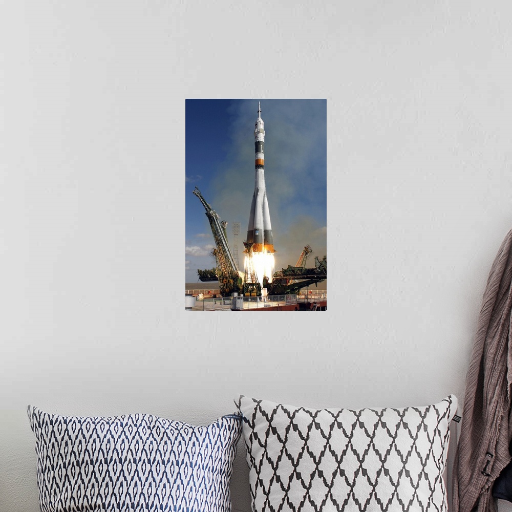 A bohemian room featuring The Soyuz TMA13 spacecraft launches from the Baikonur Cosmodrome in Kazakhstan