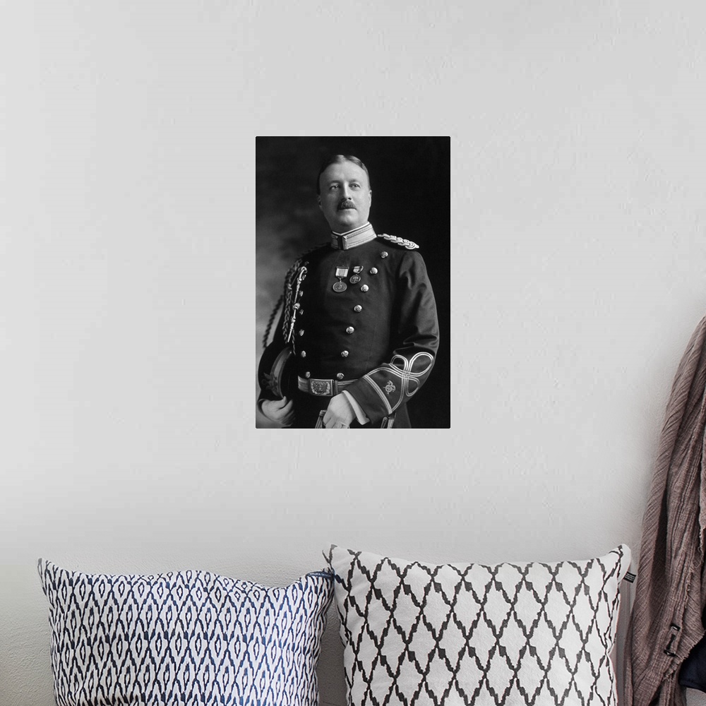 A bohemian room featuring Vintage portrait of Captain Archibald Butt in his military uniform.