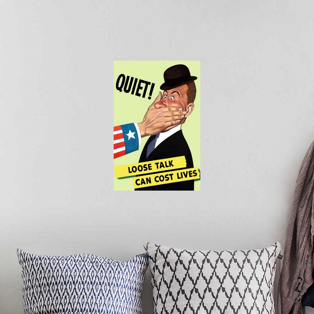 A bohemian room featuring Vintage World War II poster showing the hand of Uncle Sam covering the mouth of a man in a hat. I...