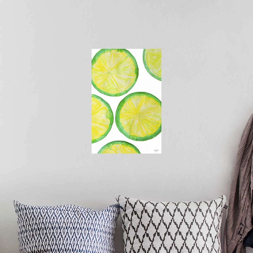 A bohemian room featuring Watercolor painting of several lime slices.