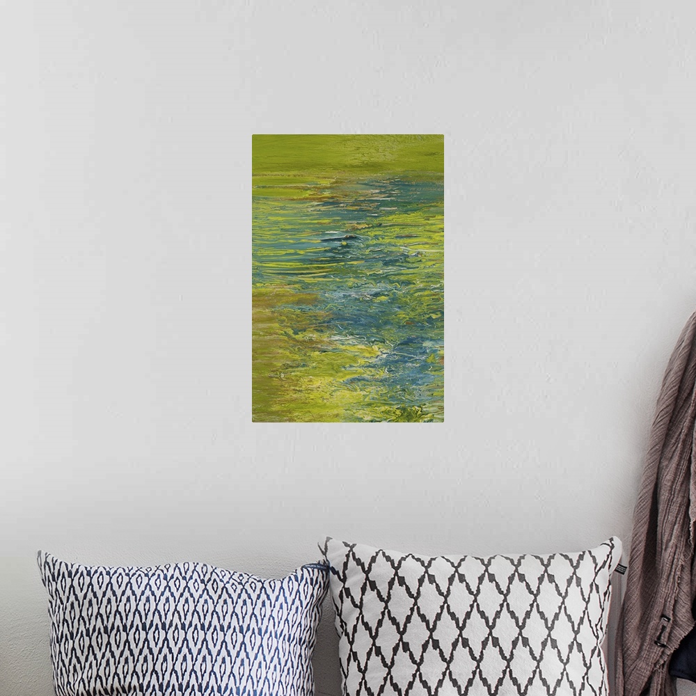 A bohemian room featuring Abstract painting in blue and green resembling ripples on water.