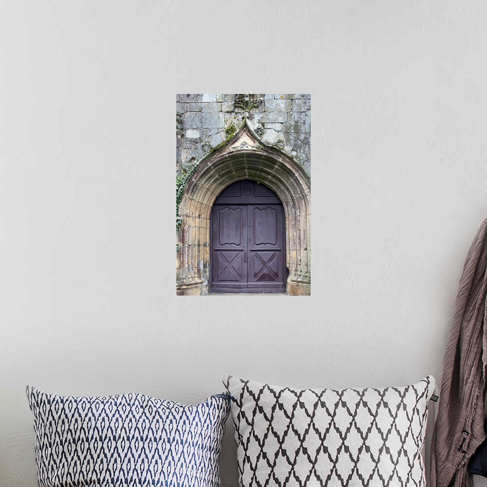 A bohemian room featuring Detail from Saint Gigner church, town of Pluvigner, departement of Morbihan, France