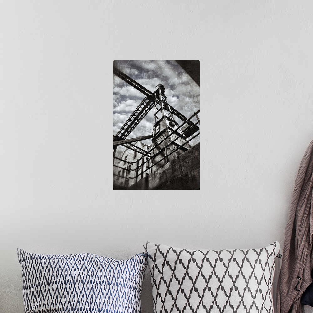 A bohemian room featuring An iron bridge seen from one of the many canals running through Amsterdam.
