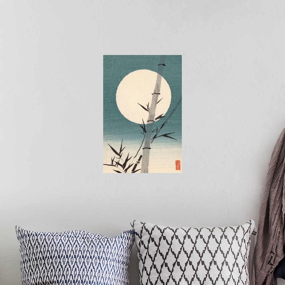 A bohemian room featuring Eastern art of a bamboo culm against the moon.