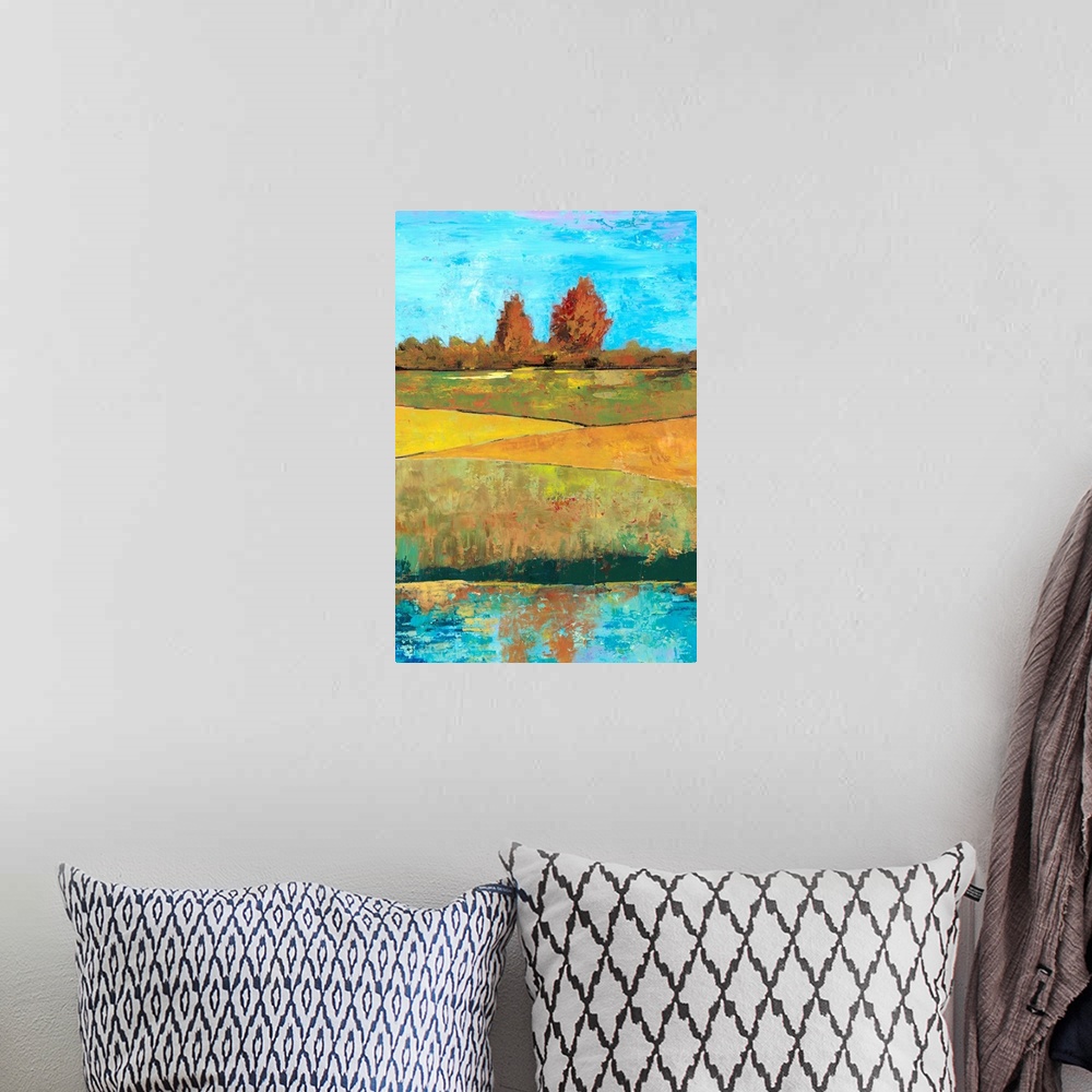 A bohemian room featuring Contemporary painting of a countryside landscape with green fields.