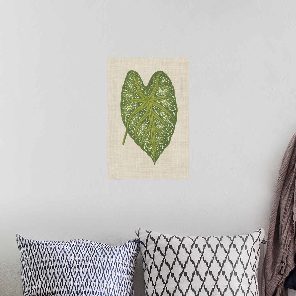 A bohemian room featuring This decorative artwork features an illustrative leaf with speckling detail over a neutral linen ...