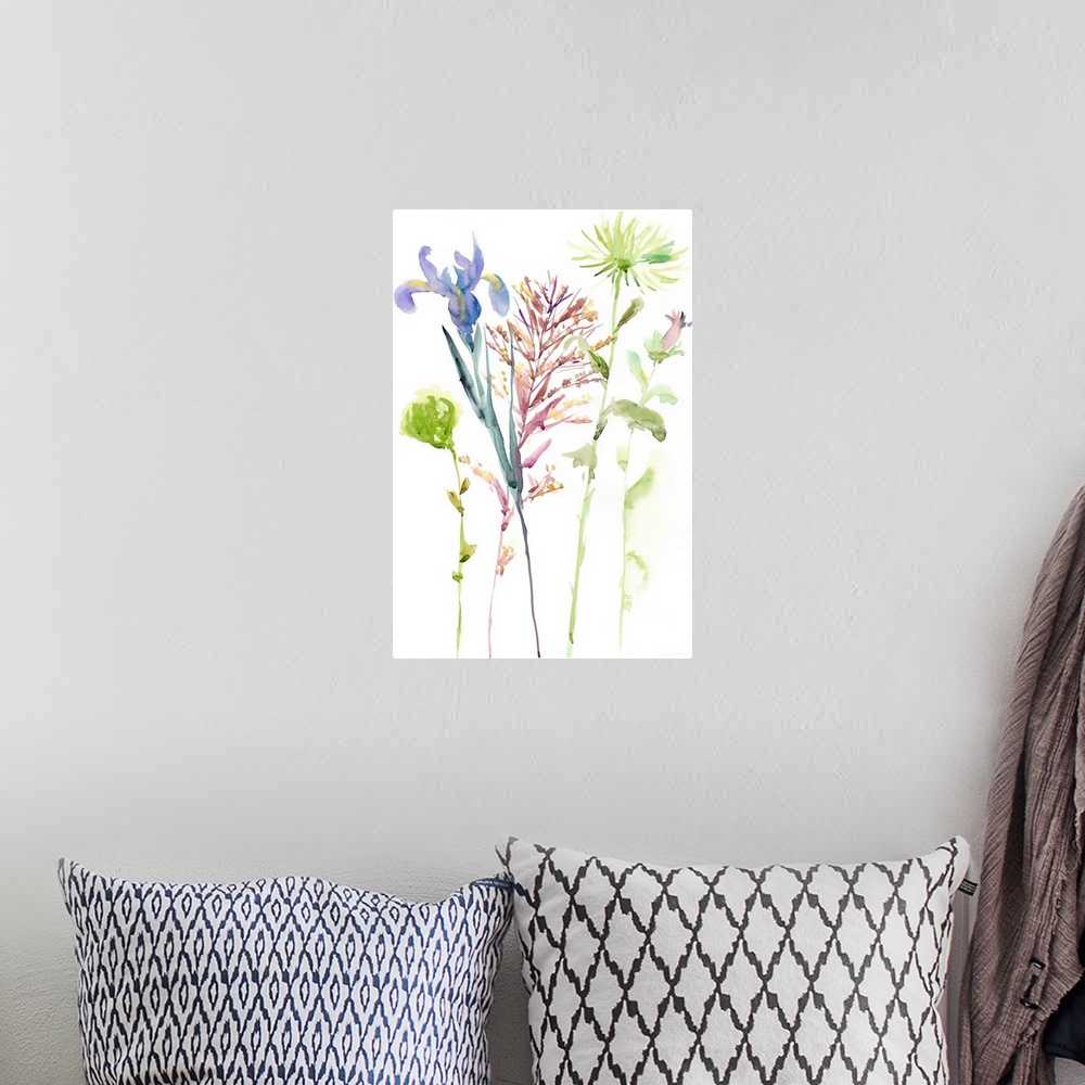 A bohemian room featuring Watercolor art print of spring flowers in pink and blue with light green leaves.
