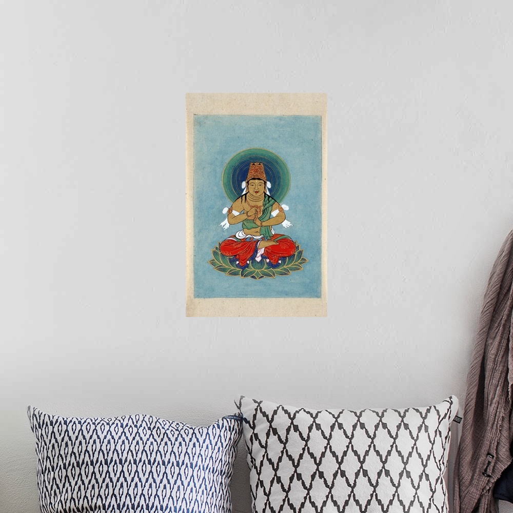 A bohemian room featuring Artwork of Buddhist figure.