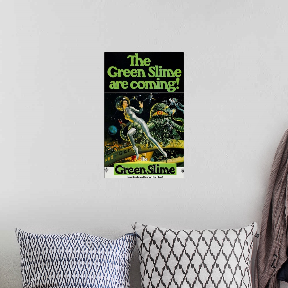 A bohemian room featuring The Green Slime - Vintage Movie Poster