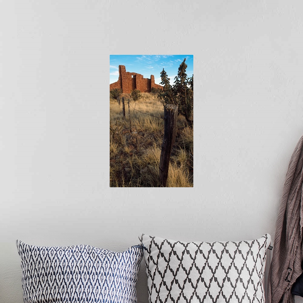 A bohemian room featuring Barbed-wire fence line, hilltop ruins, New Mexico