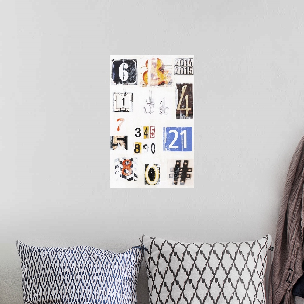 A bohemian room featuring Contemporary art with uniquely designed numbers and signs with a vintage feel on a white background.