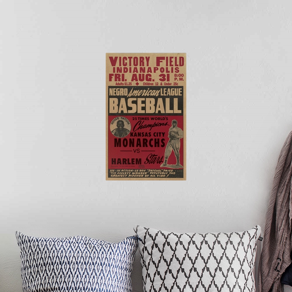 A bohemian room featuring A Negro American League baseball poster featuring Satchel Paige and Goose Tatum.
