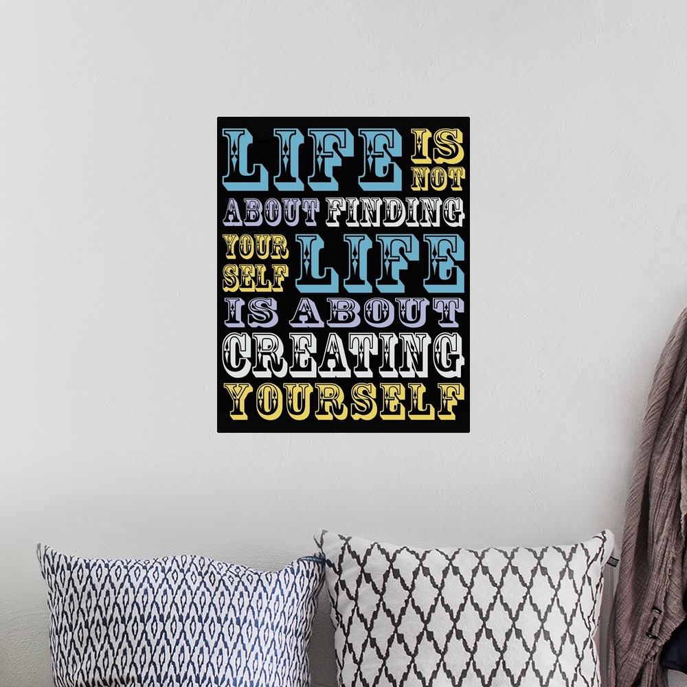 A bohemian room featuring Typography inspirational quote art, with lettering done in a fun carnival style.