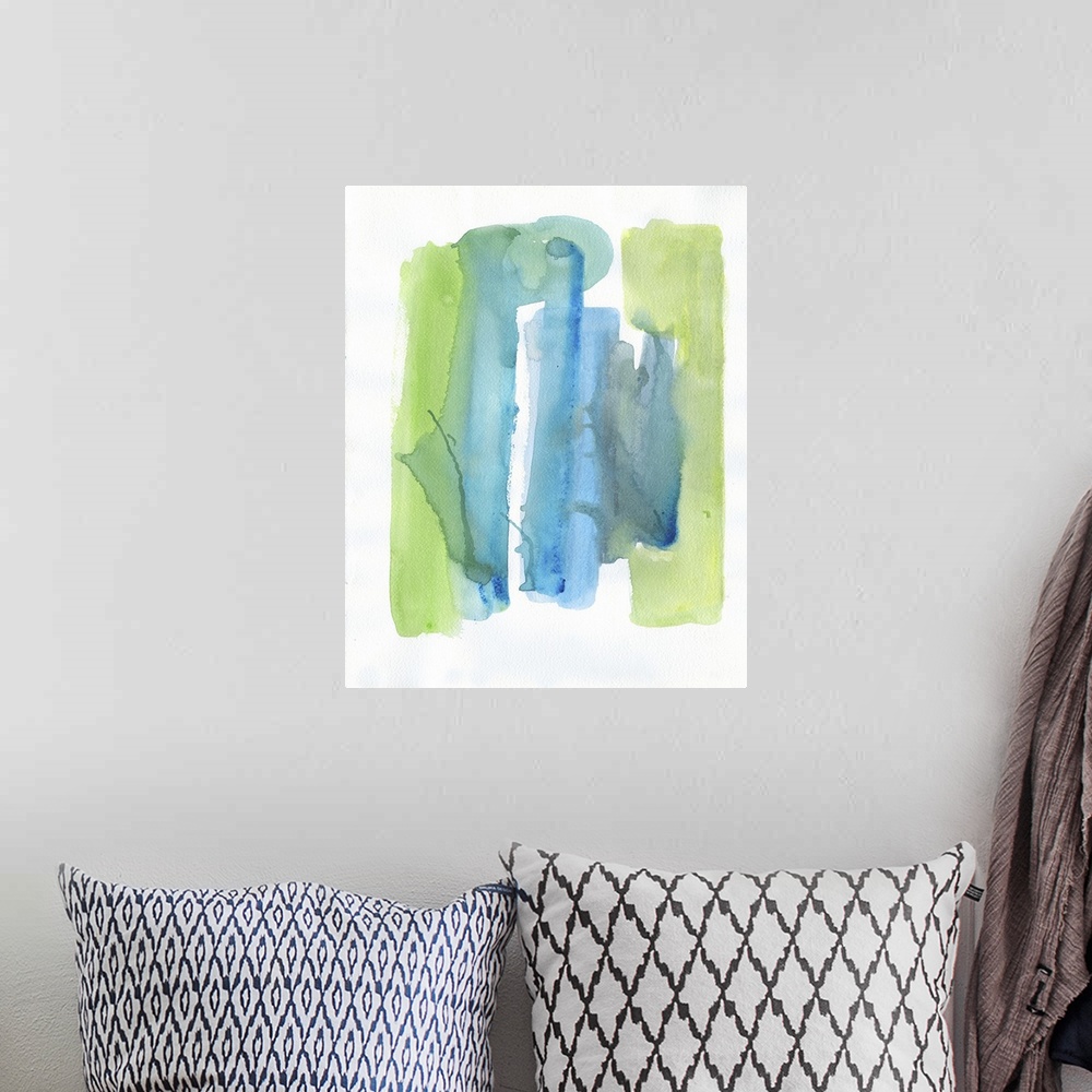 A bohemian room featuring Watercolor abstract artwork in shades of vivid blue and lime green.