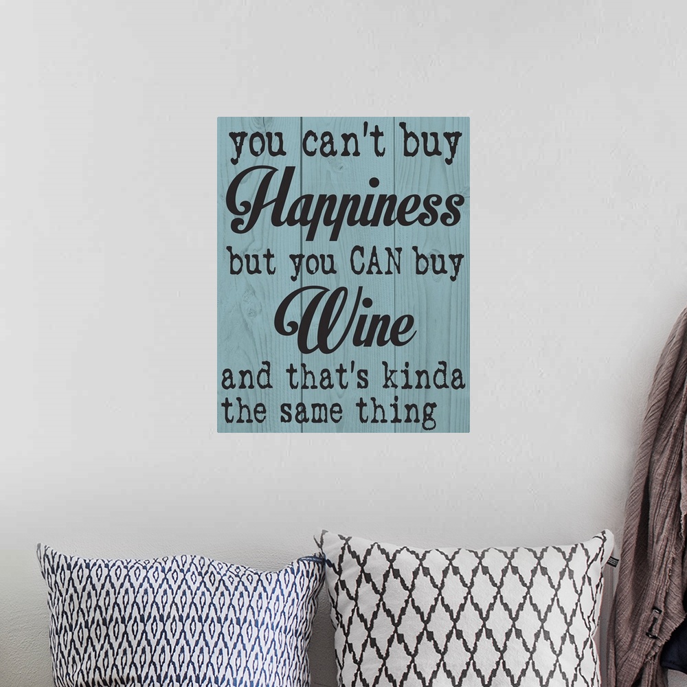 A bohemian room featuring "You can't buy happiness, but you can buy wine and that's kinda the same thing" written on a wood...
