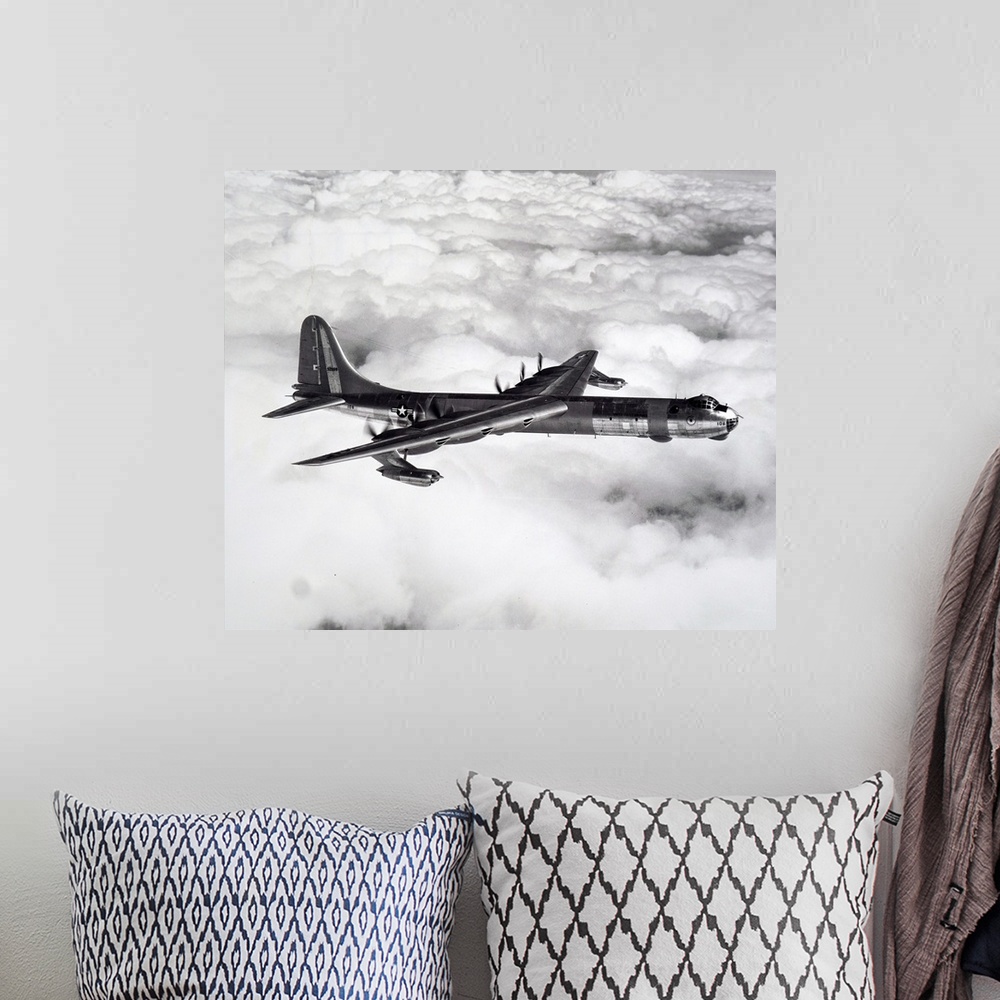 A bohemian room featuring Photograph of a Convair B36 Peacemaker. The Convair B36 Peacemaker was a strategic bomber plane b...