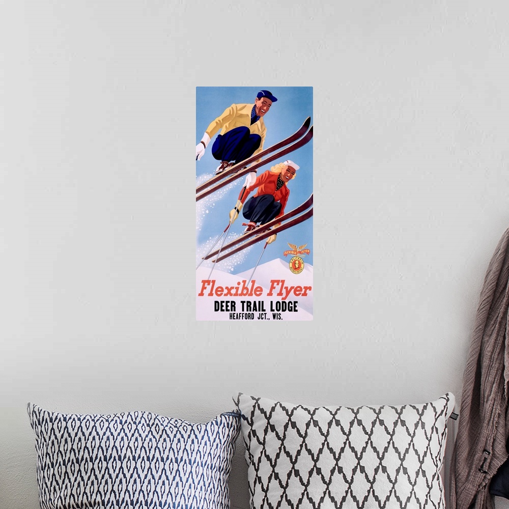 A bohemian room featuring Old poster print advertising ski lodge.  Two skiers are in mid air over snow with the text "Deer ...