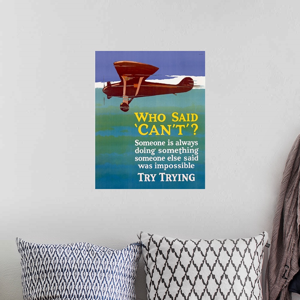 A bohemian room featuring Old print of plane flying through sky with inspirational text below.