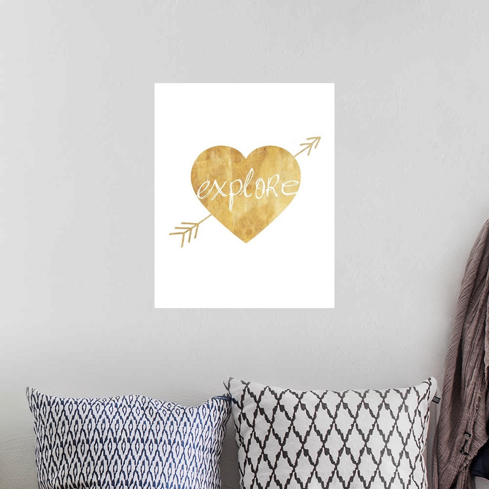 A bohemian room featuring White lettering inside a gold heart with an arrow through it against a white background.