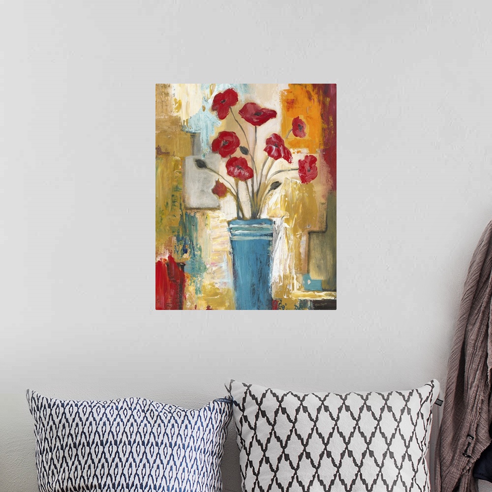 A bohemian room featuring Contemporary still life painting of a blue vase filled with red poppies.