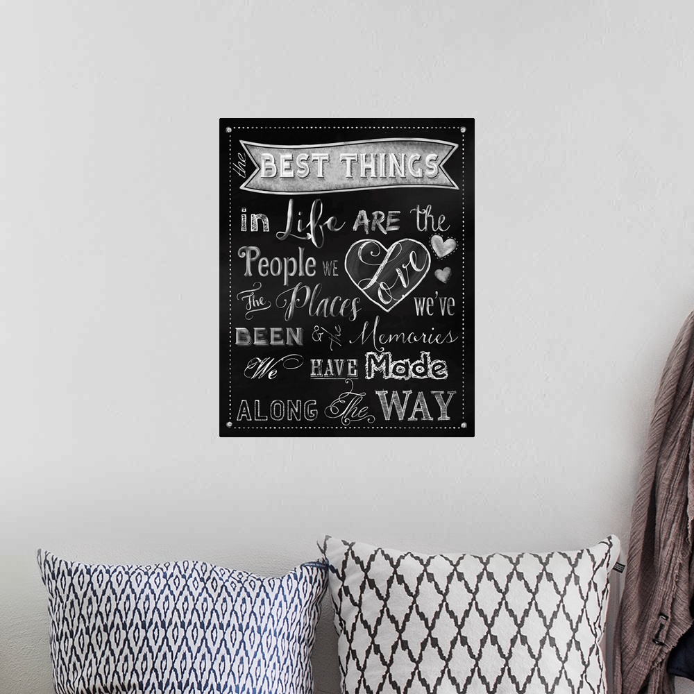 A bohemian room featuring Best Things Chalkboard