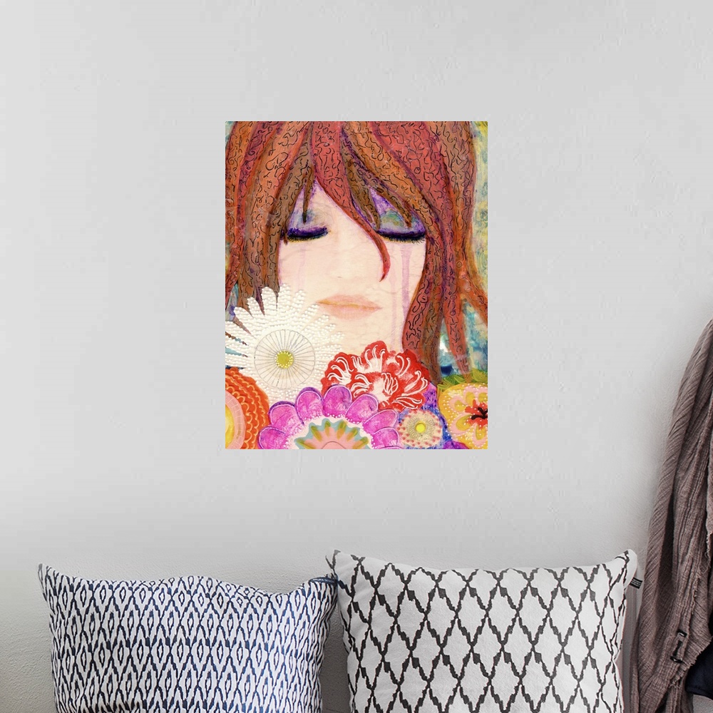A bohemian room featuring A girl holding a bouquet of flowers near her face.